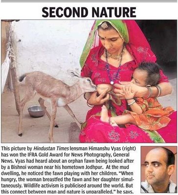 Animals+nursing+other+species